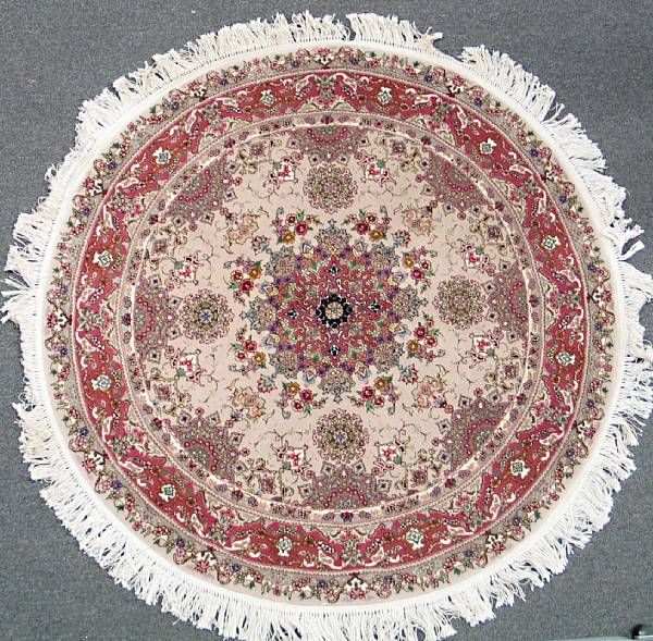 Appraisal: A Tabriz design rug size approximately ft x ft