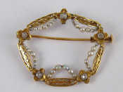 Appraisal: An antique carat gold and seed pearl brooch with rose