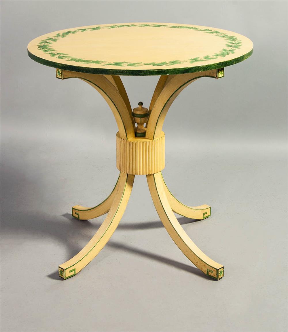 Appraisal: DECORATIVE PAINTED CIRCULAR TABLE WITH UNUSUAL BASE yellow painted top