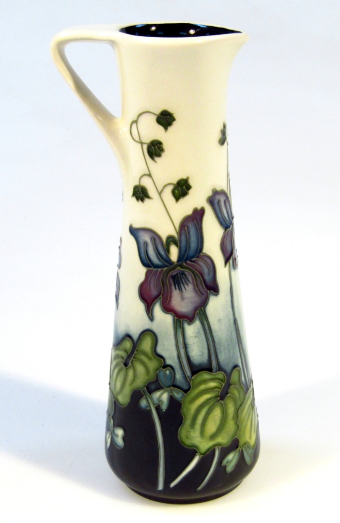 Appraisal: A Moorcroft pottery ewer by Nicholas Slaney of tapering cylindrical