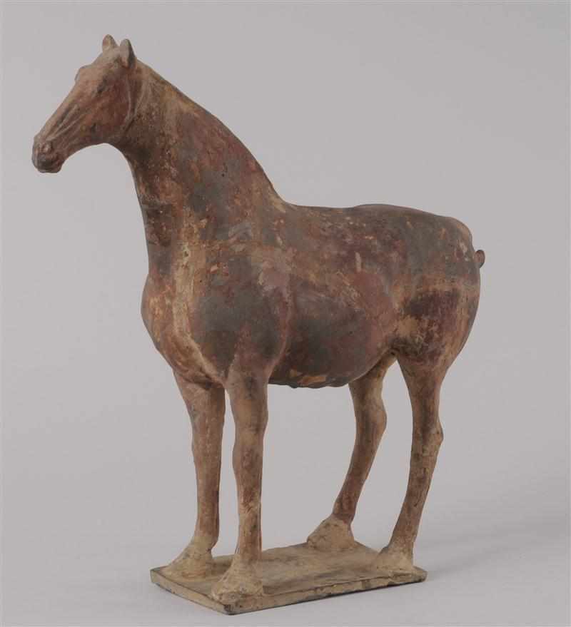 Appraisal: TANG POTTERY FIGURE OF A HORSE Standing on rectangular base