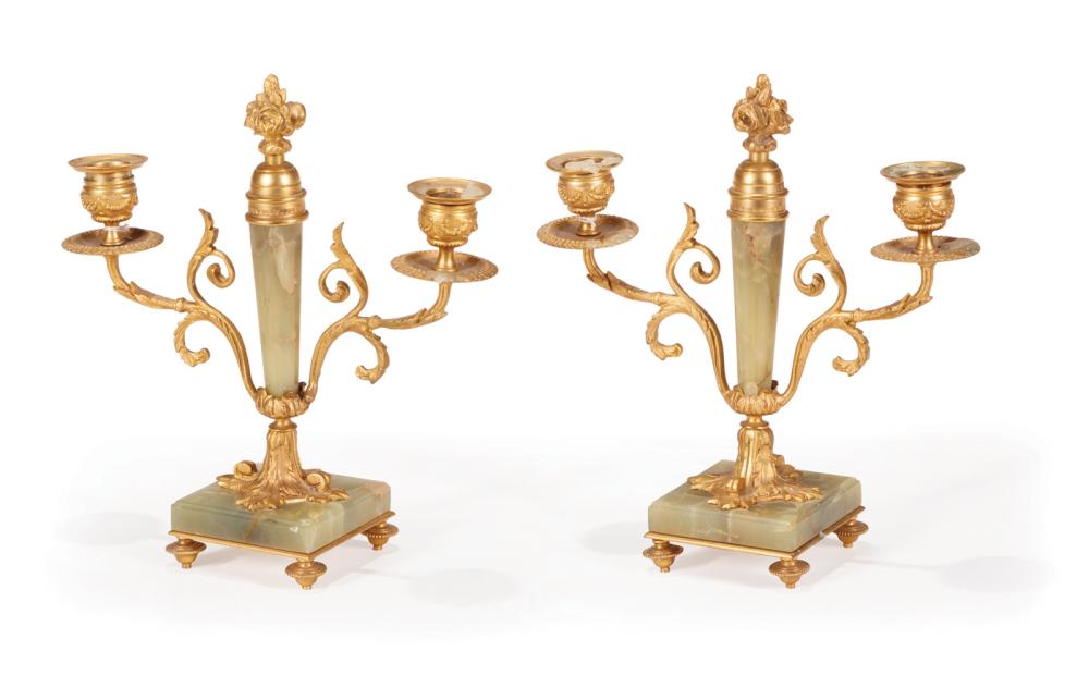 Appraisal: Pair of Louis XVI-Style Bronze-Mounted Onyx Two-Light Candelabra fluted standard