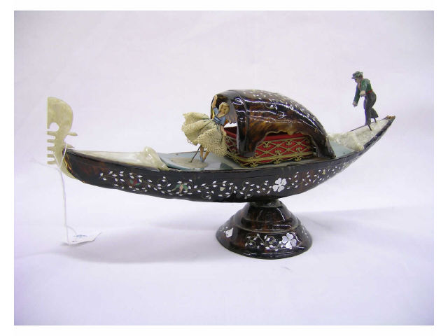 Appraisal: Vintage faux tortoise shell souvenir gondola with figures and trinket