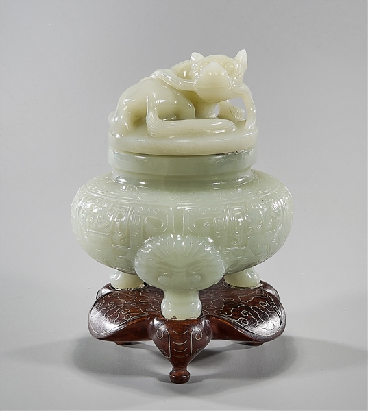 Appraisal: Chinese carved jade covered tripod censer with mask faces in