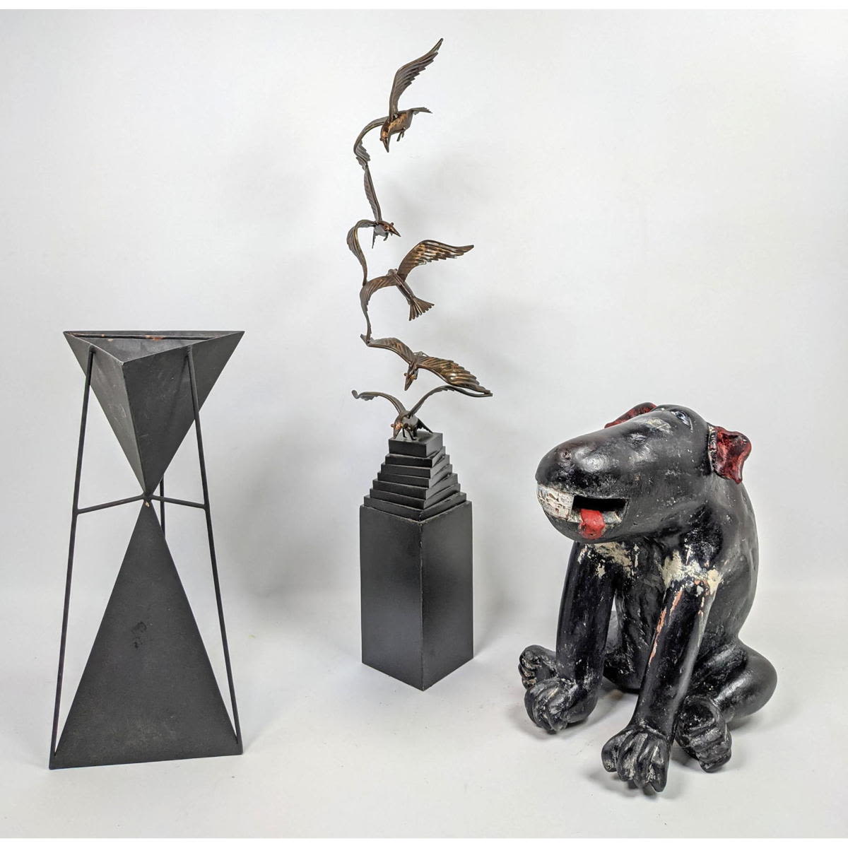 Appraisal: pc modern shelf lot figural dog Triangle sculpture Bird sculpture