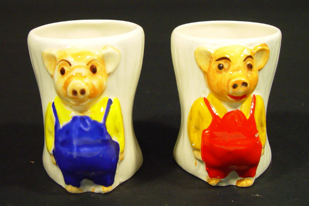 Appraisal: Set of Pinky and Perky novelty china eggcups each with