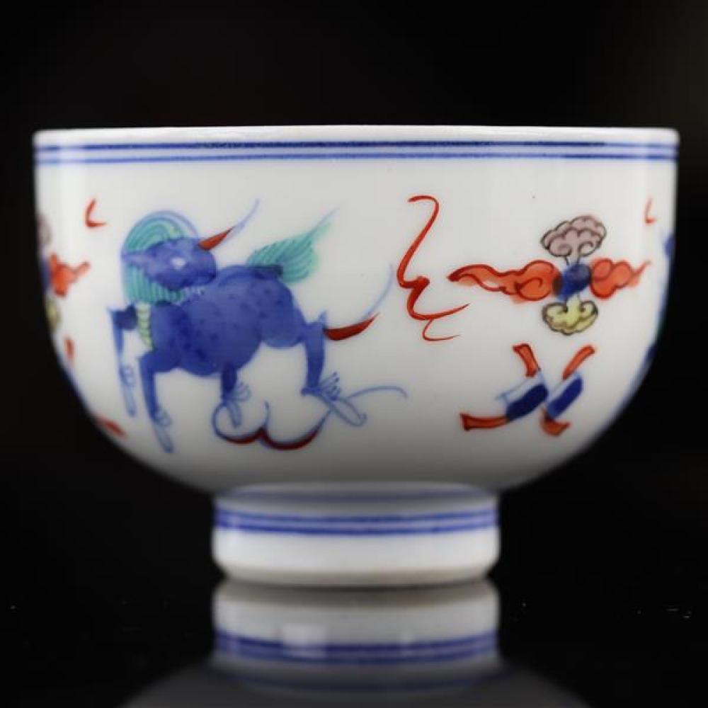 Appraisal: CHINESE DOU CAI QING PORCELAIN FOOTED TEA CUP WITH FIGURAL