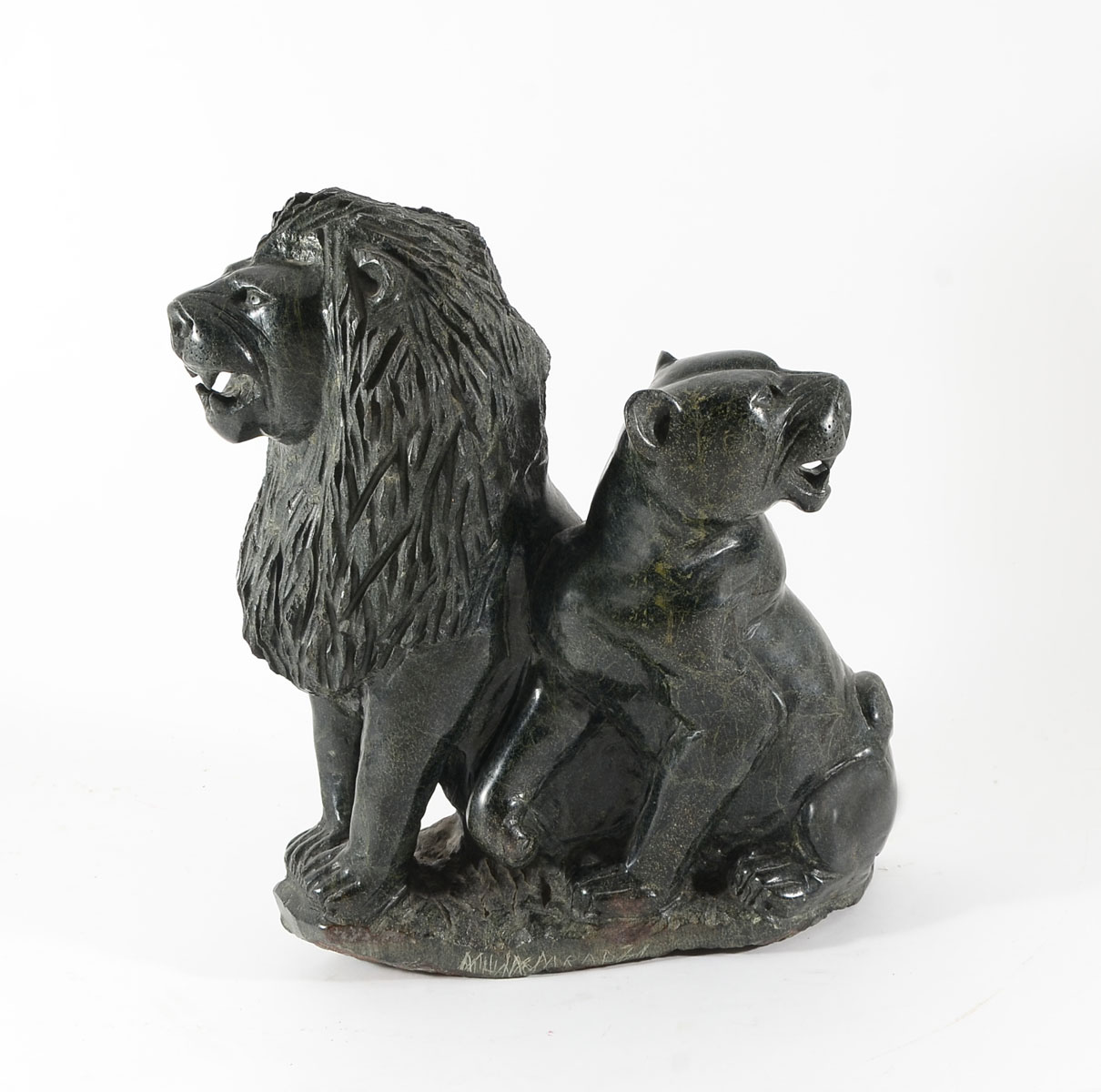 Appraisal: CARVED LION SCULPTURE Carved green hardstone sculpture of lions Illegible