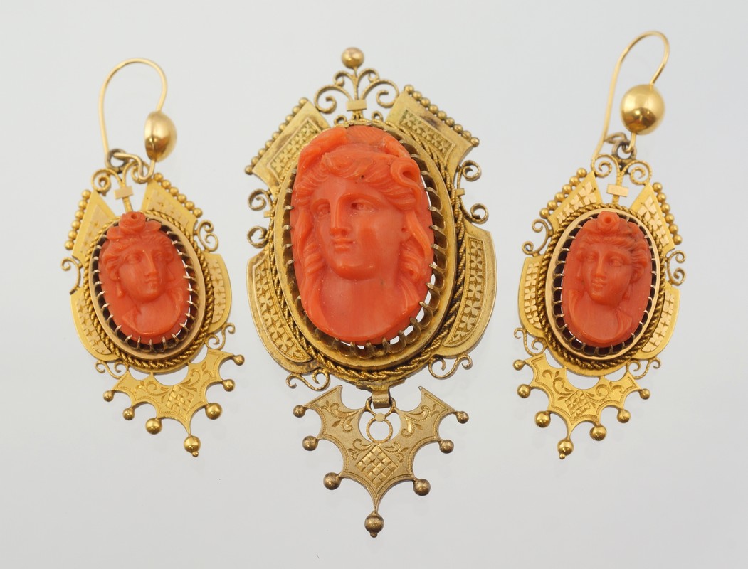 Appraisal: Unmarked YG Etruscan carved coral cameo pin with matching earrings