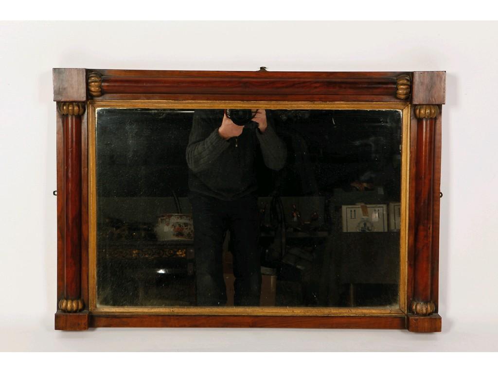 Appraisal: A REGENCY ROSEWOOD AND GILT DECORATED OVERMANTEL MIRROR the rectangular