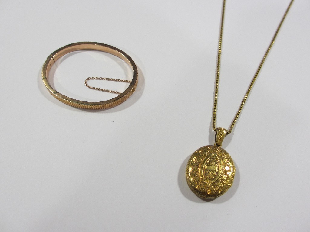 Appraisal: Lot comprising a highly engraved Victorian yellow metal photo locket