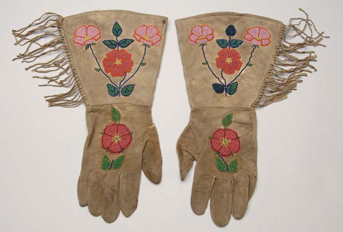 Appraisal: PAIR OF BEAD DECORATED GLOVES Gloves have colorful red trimmed