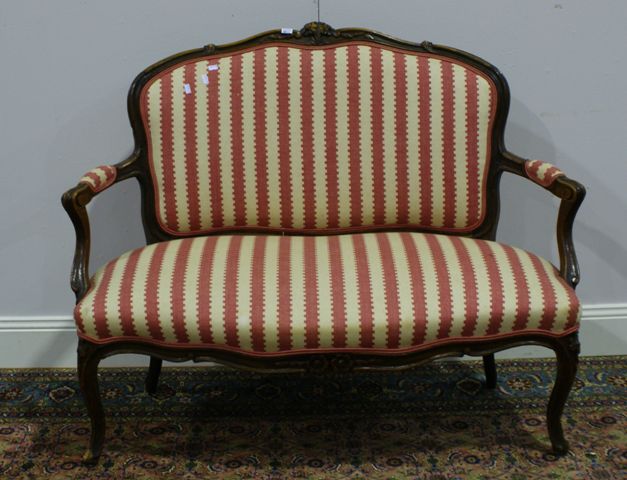 Appraisal: A Louis XV style walnut and upholstered settee late th