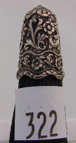 Appraisal: India silver thimble with floral scalloped rim