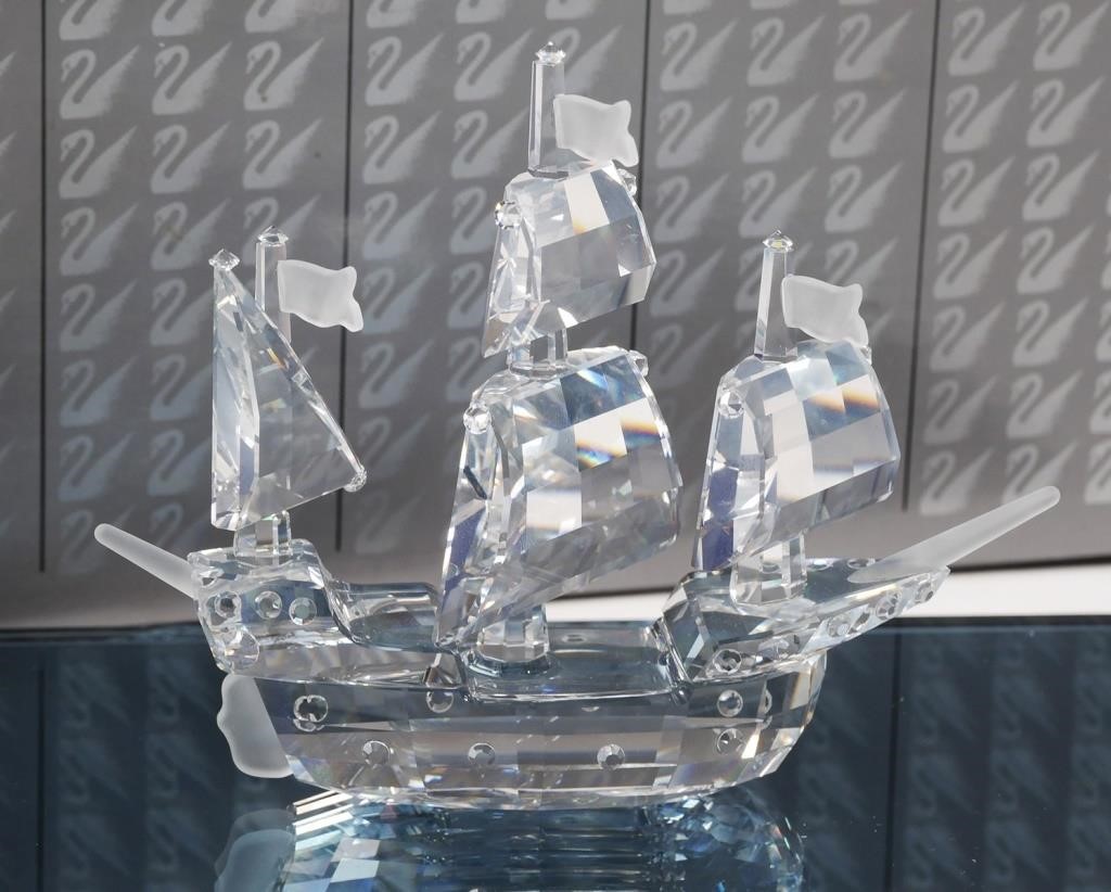 Appraisal: Two crystal sailing ship statues by Swarovski including Sailing Legend