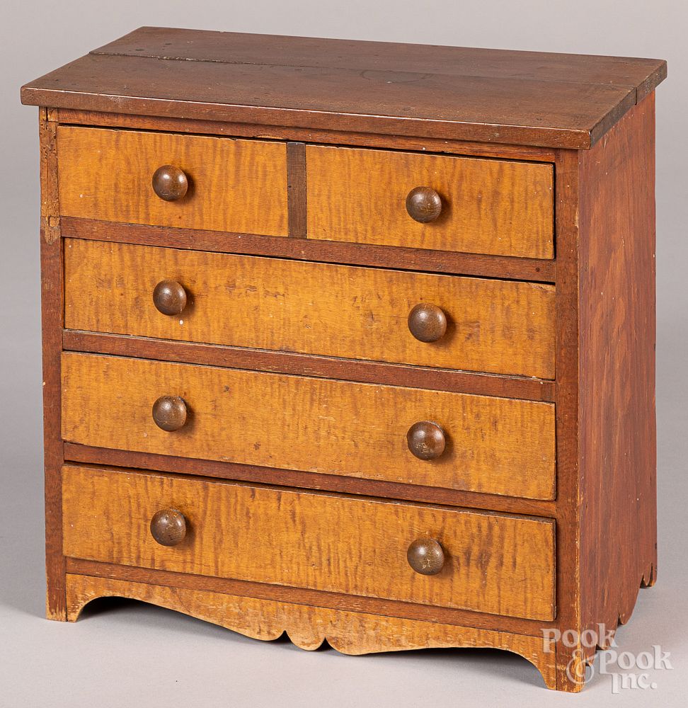 Appraisal: Miniature tiger maple and cherry chest of drawers Miniature tiger