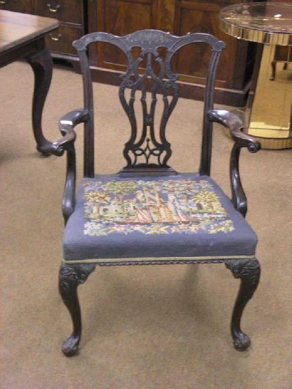 Appraisal: A good Victorian Chippendale armchair with carved sea-scroll cresting interlaced