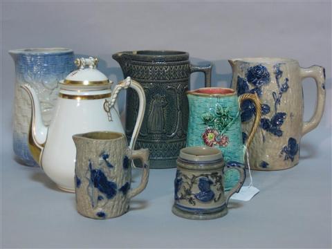 Appraisal: FIVE EARTHENWARE PITCHERS Including three large and two small together