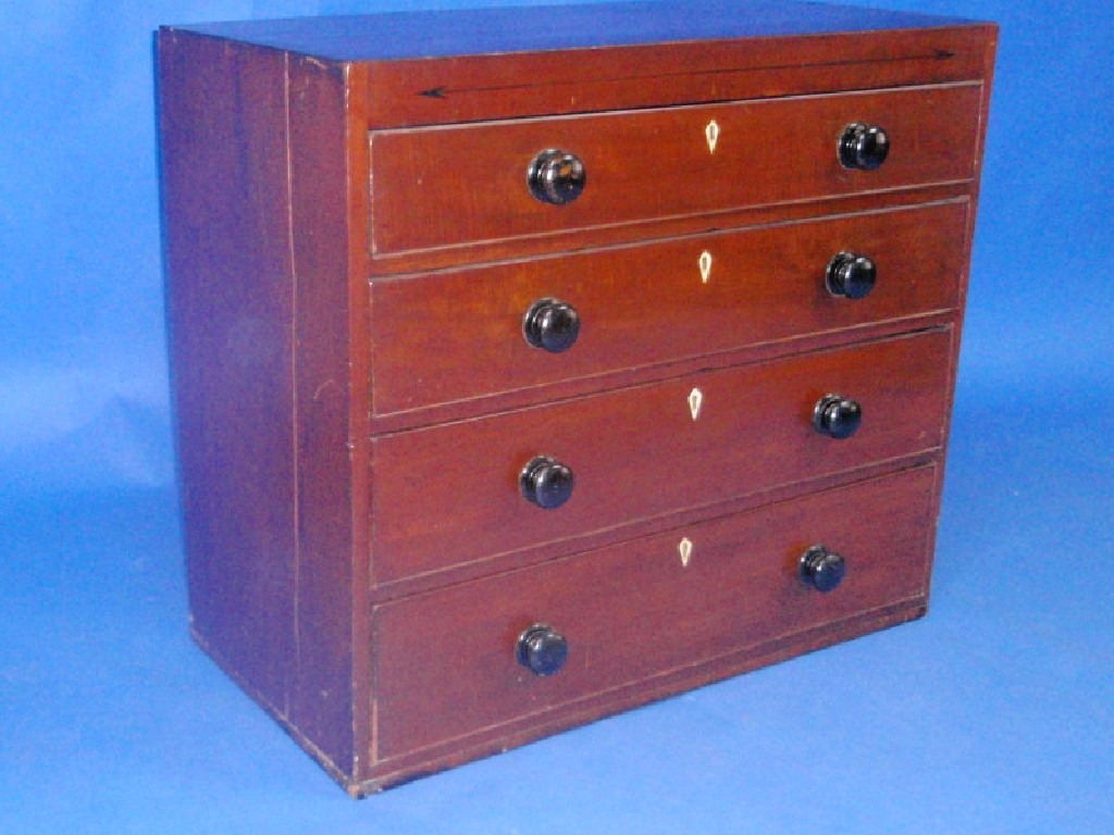 Appraisal: A Georgian mahogany chest of four graduated drawers with knob