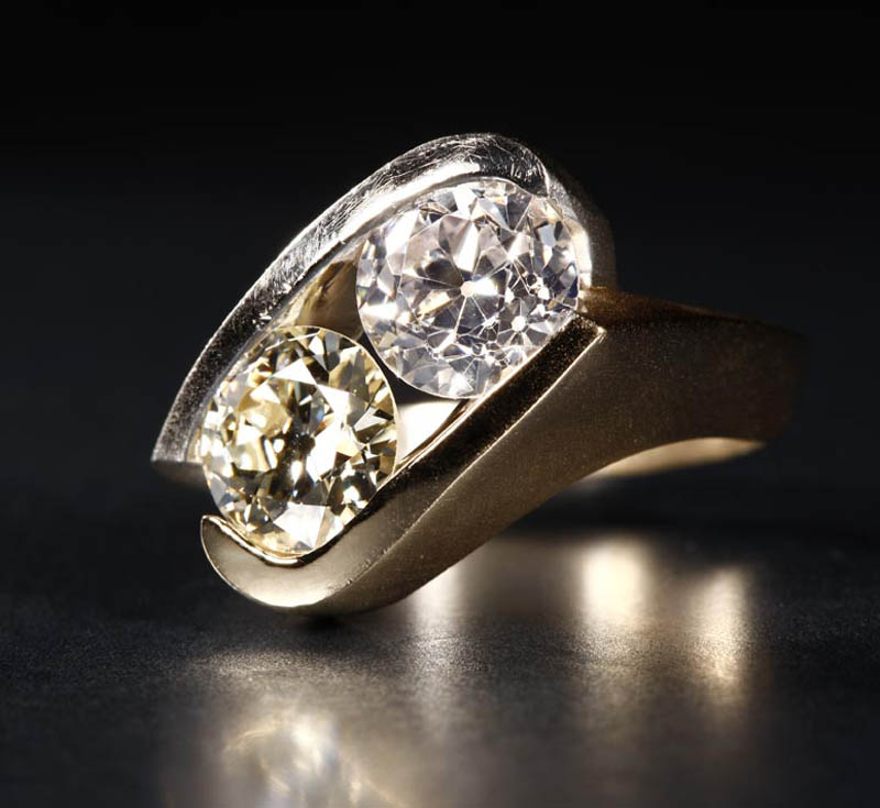 Appraisal: A twin stone diamond ring A twin stone diamond ringPlatinum