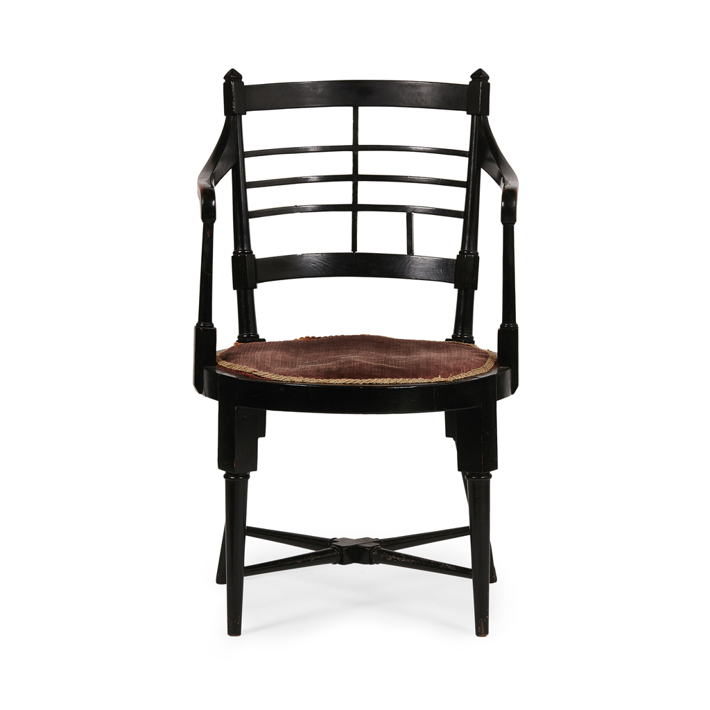 Appraisal: EDWARD WILLIAM GODWIN - EBONISED 'JACOBEAN' ARMCHAIR CIRCA with curved