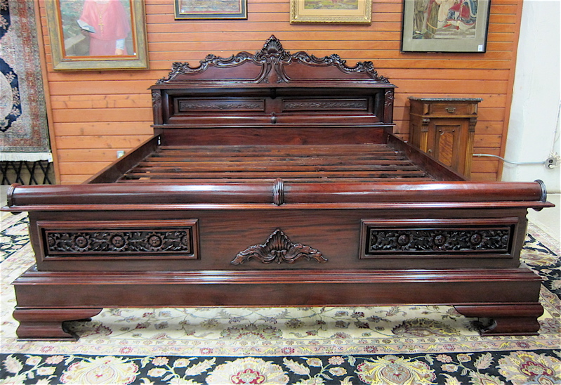 Appraisal: VICTORIAN STYLE CARVED MAHOGANY BED king size the panel headboard