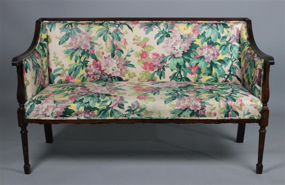 Appraisal: SHERATON STYLE FLORAL UPHOLSTERED MAHOGANY SETTEE slightly arched backrest above