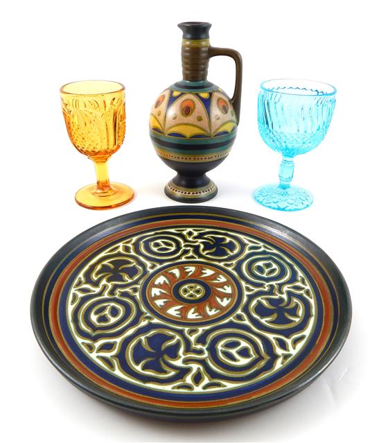 Appraisal: Gouda Art Pottery and colored glassware four pieces Gouda circular