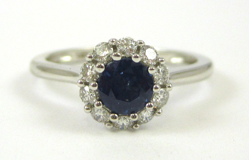 Appraisal: SAPPHIRE DIAMOND AND FOURTEEN KARAT GOLD RING The white gold