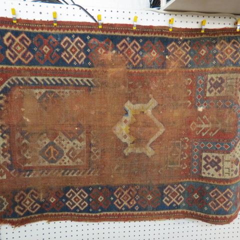 Appraisal: Antique Persian or Turkish Rug perimarily reds blues ivory '