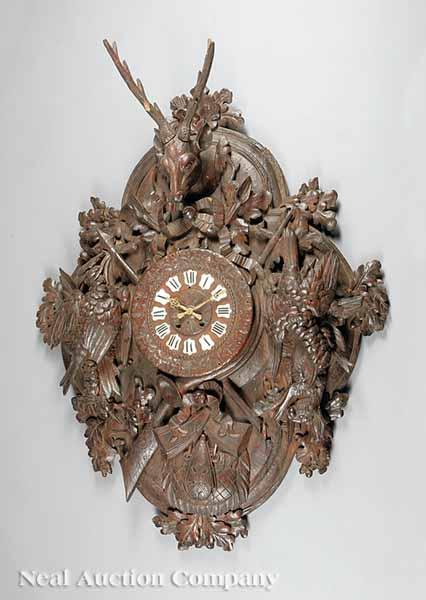 Appraisal: A Monumental Black Forest Carved Walnut Wall Clock late th