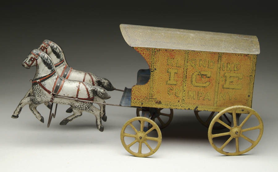 Appraisal: A LARGE LITHOGRAPHED KLONDIKE ICE HORSE DRAWN WAGON Wagon is