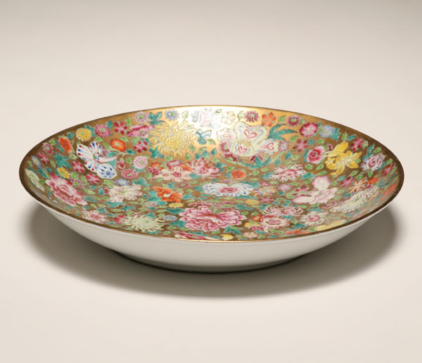 Appraisal: Hand painted Asian charger bowl gilt body with profuse rose