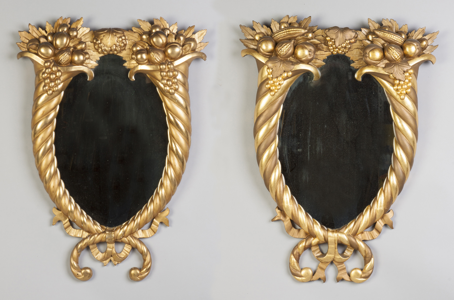 Appraisal: Pair of Carved Gilt Wood Cornucopia Mirrors th cent