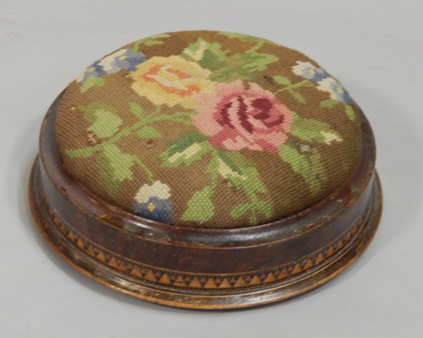 Appraisal: A Victorian walnut and parquetry circular foot stool with a