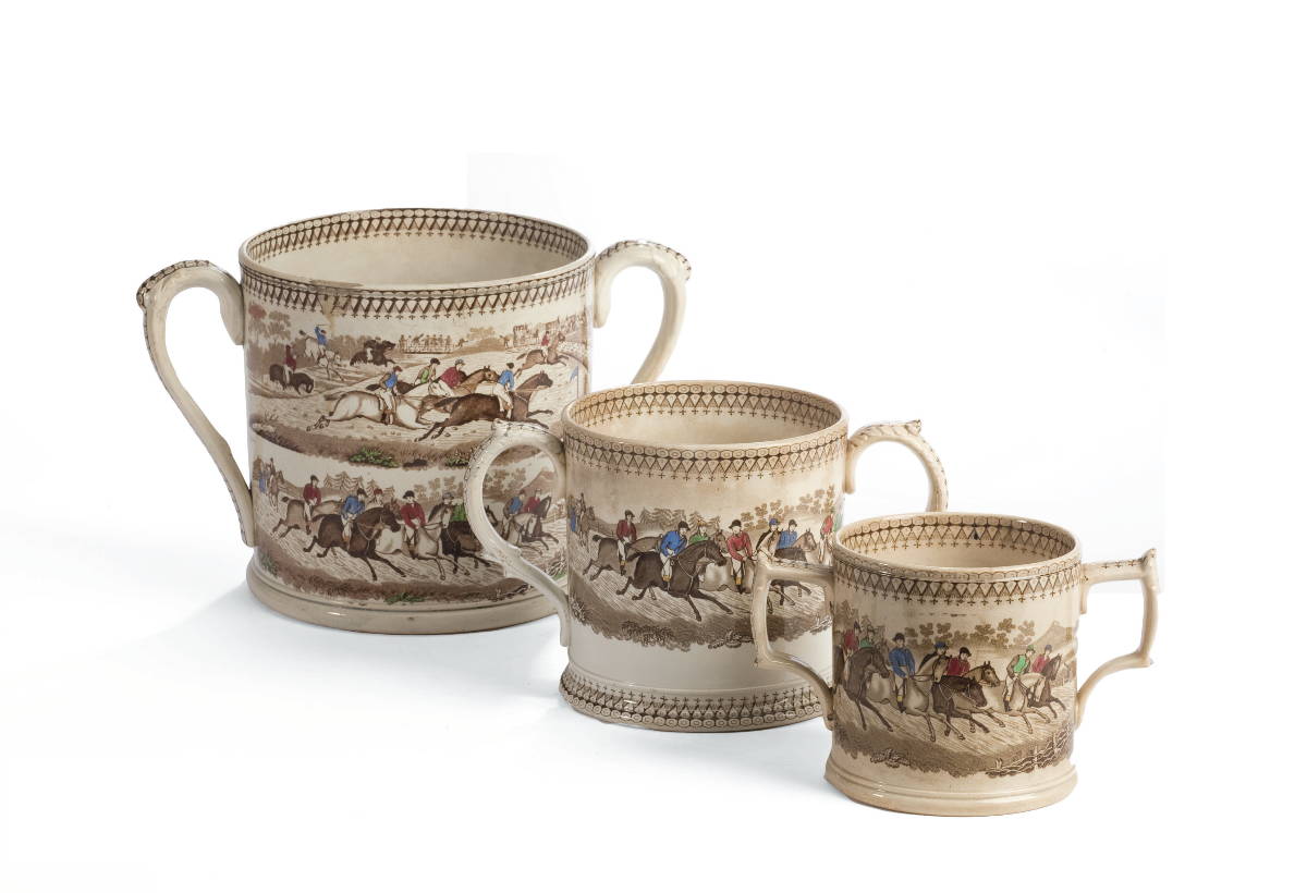 Appraisal: THREE STAFFORDSHIRE ENAMEL-DECORATED BROWN TRANSFER-PRINTED 'STEEPLE CHASE' MUGS JOHN ROBERT