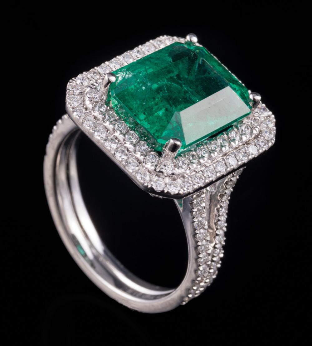 Appraisal: Platinum Emerald and Diamond Ring center prong set octagonal step