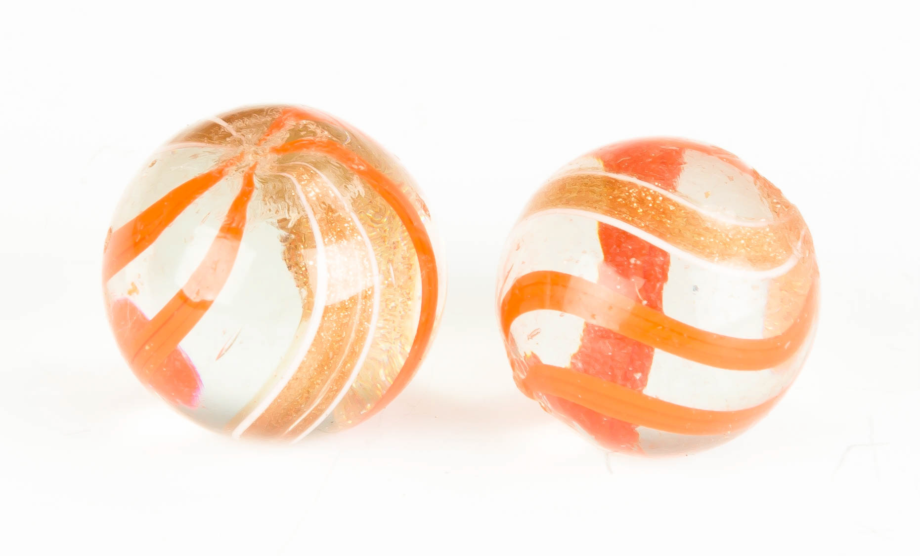 Appraisal: Two Vintage Gold Lutz Marbles