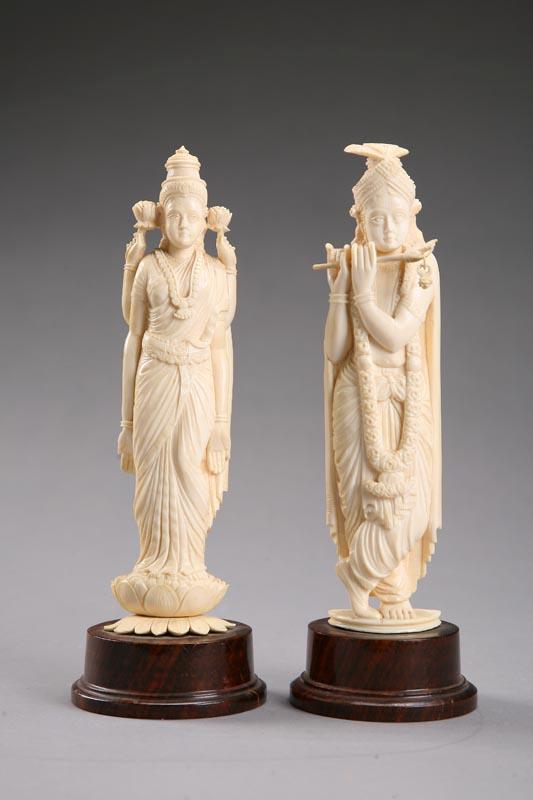 Appraisal: TWO CARVED INDIAN FIGURES A goddess with four arms and