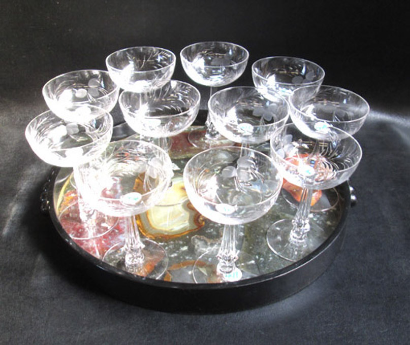 Appraisal: ELEVEN CRYSTAL CHAMPAGNE GLASSES WITH TRAY stemware engraved and acid