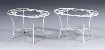 Appraisal: Pair painted wrought iron tables oval glass top over vine