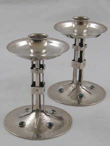 Appraisal: An exceptional pair of silver candlesticks by A E Jones