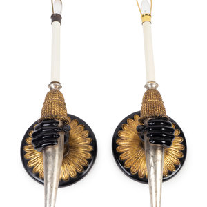 Appraisal: A Pair of Regency Style Parcel-Gilt and Ebonized Sconces TH