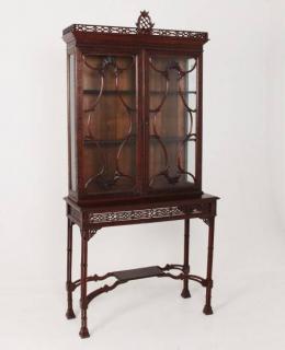 Appraisal: CHINESE CHIPPENDALE STYLE MAHOGANY DISPLAY CABINET ON CLUSTER BAMBOO FORMED