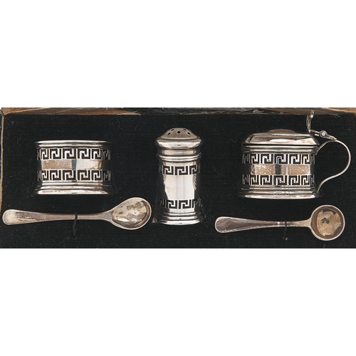 Appraisal: A George V three piece pierced silver condiment set blue