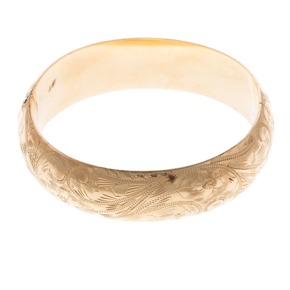 Appraisal: A Ladies Engraved Wide Bangle Bracelet in K K yellow