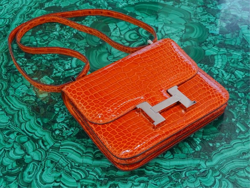 Appraisal: Hermes Shiny Orange Alligator Micro Mini Constance Hermes Shiny Orange