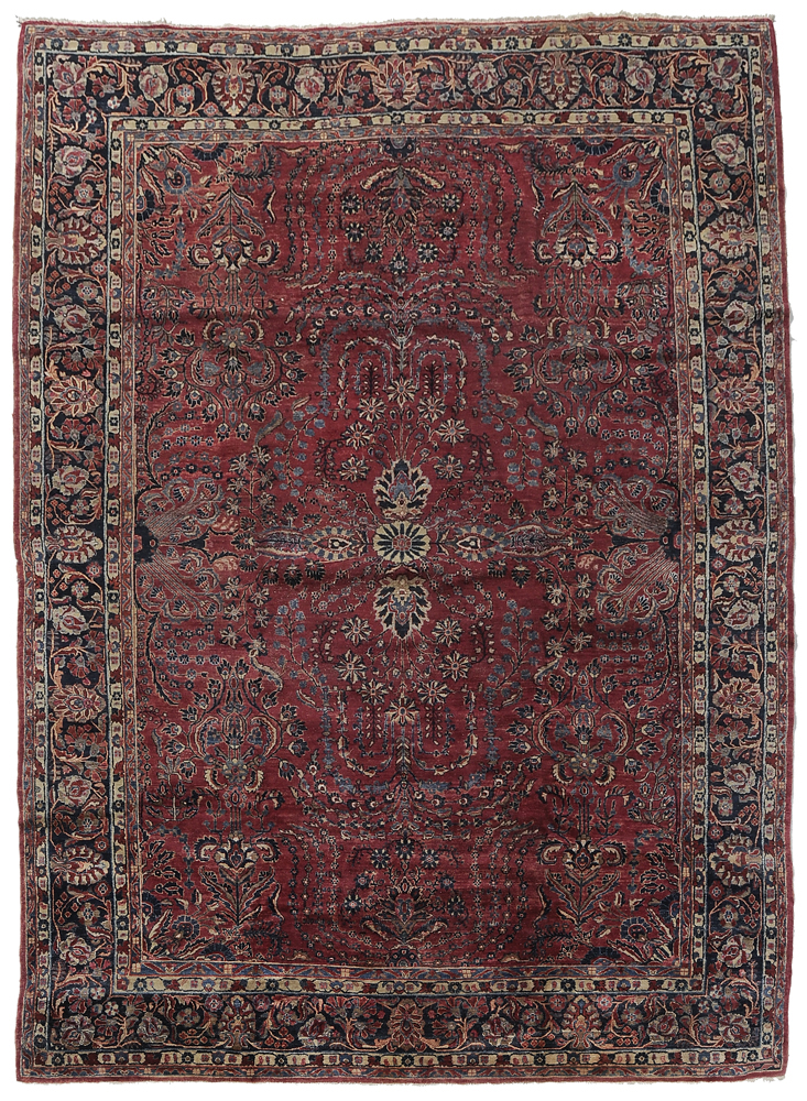 Appraisal: Sarouk Carpet Persian s floral and vine designs on burgundy