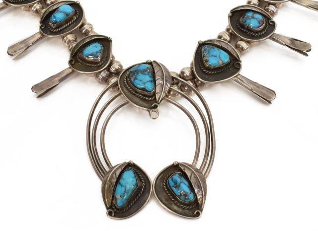 Appraisal: Native American silver content unknown squash blossom necklace ten turquoise-set