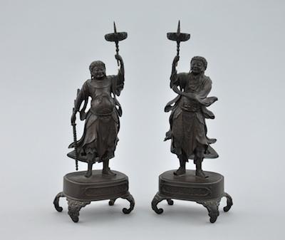 Appraisal: A Pair of Chinese Bronze Figural Candlesticks ca Late th